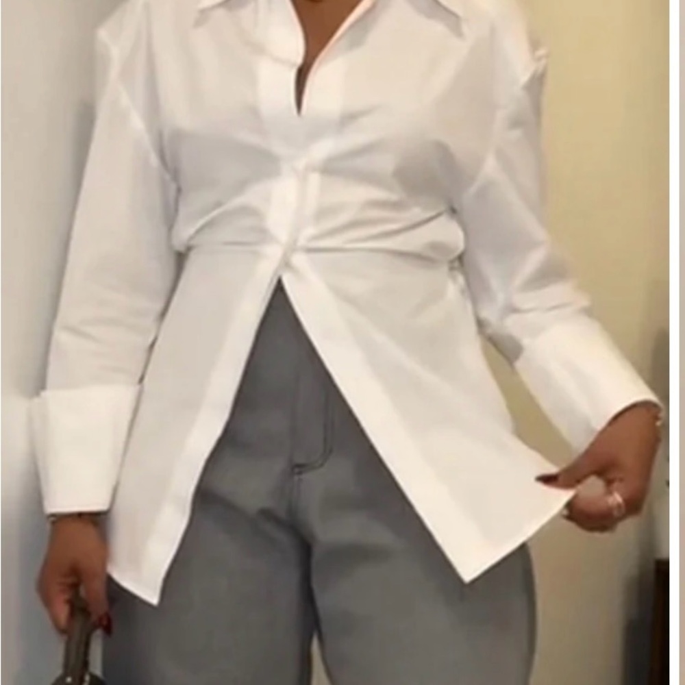 Elegant White Women's Waist-length long-sleeved solid color shirt.